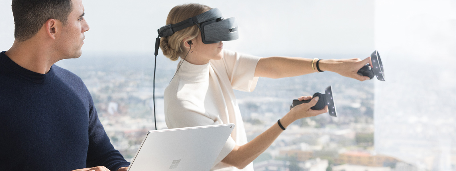 A woman using a Windows Mixed Reality headset and motion controller