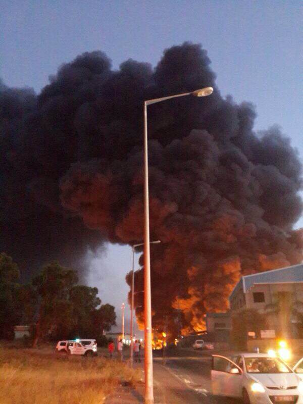 A rocket fired from Gaza directly hit a factory in the industrial zone of the southern Israeli city of Sderot, causing it to catch on fire, Saturday evening, June 28, 2014. The fire led to further explosions inside the factory. (Photo credit: Edit Israel/Flash90) A rocket fired from Gaza directly hit a factory in the industrial zone of the southern Israeli city of Sderot, causing it to catch on fire, Saturday evening, June 28, 2014. The fire led to further explosions inside the factory. (Photo credit: Edit Israel/Flash90)