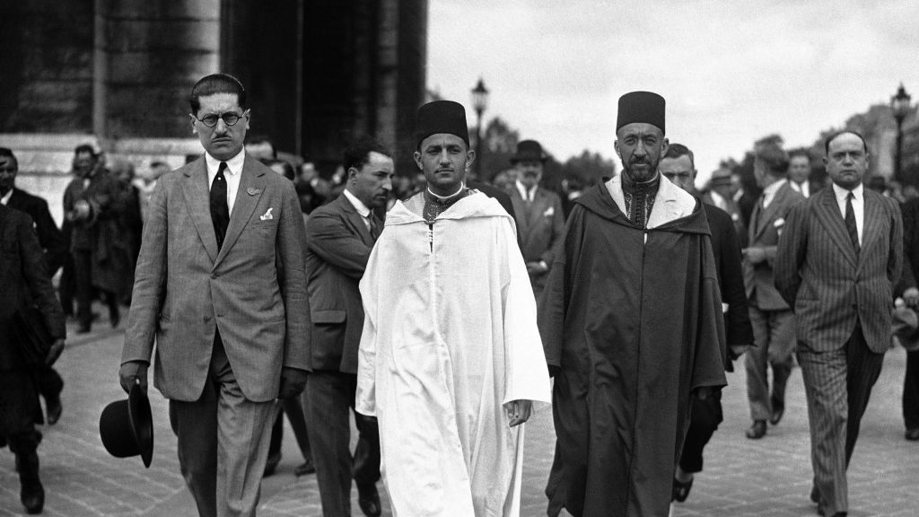 File: Morocco's Mohammed V, wearing white robes, walking with the country's Grand Vizier Si Mohammed El Mokri after he placed a wreath on the Tomb of the Unknown Warrior at the Arc De Triomphe during a visit to Paris, France around July 4, 1930. (AP Photo) File: Morocco's Mohammed V, wearing white robes, walking with the country's Grand Vizier Si Mohammed El Mokri after he placed a wreath on the Tomb of the Unknown Warrior at the Arc De Triomphe during a visit to Paris, France around July 4, 1930. (AP Photo)