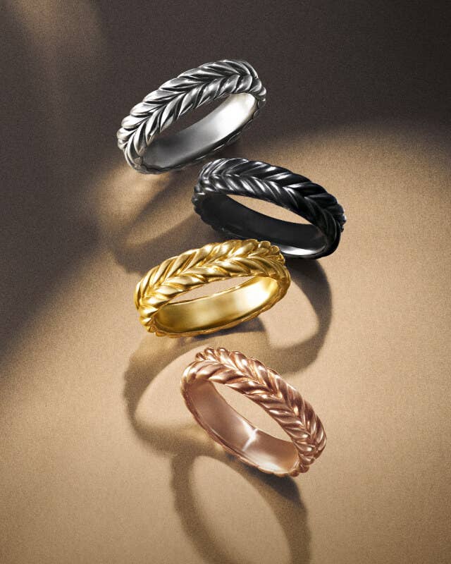 Four David Yurman Chevron rings for men.