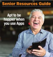 smiling man with tablet