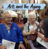 older woman learning to play the ukulele
