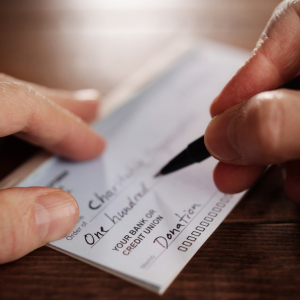 hand writing a check