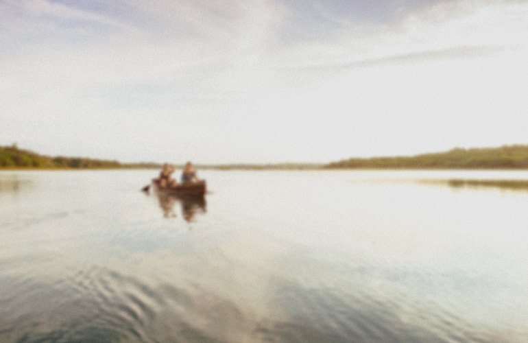 Boaters on a lake at BT Camps.