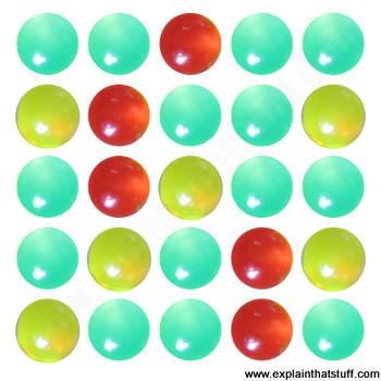 An array of green, yellow, and red colorful quantum dots.