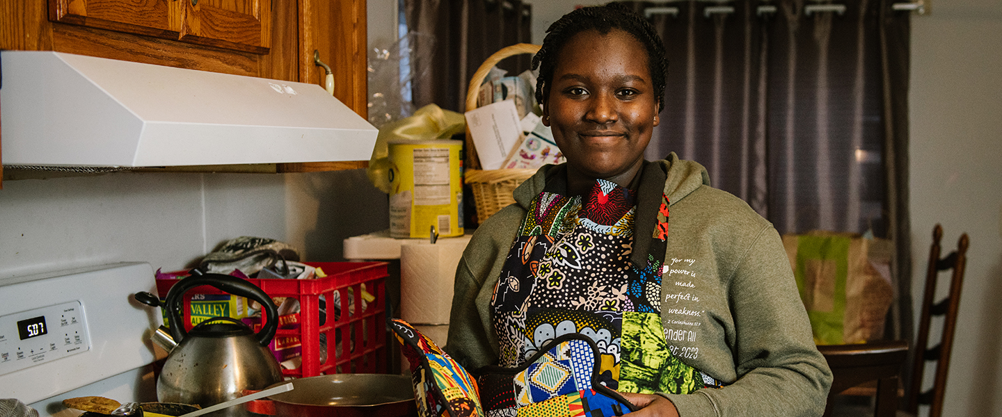 HIAS EAF client Jacqueline Imani displays homemade clothing and accessories inspired by Congolese fashion and sold by Imani Handmade Crafts. | HIAS Economic Advancement Fund