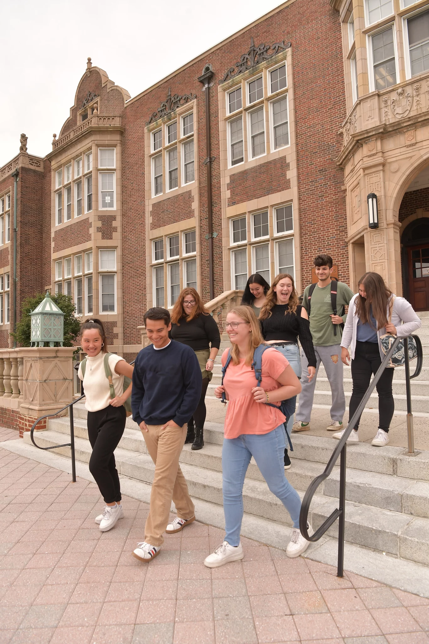 students walking out of building