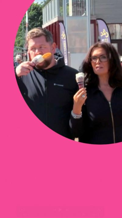 Man and woman eating ice cream cones