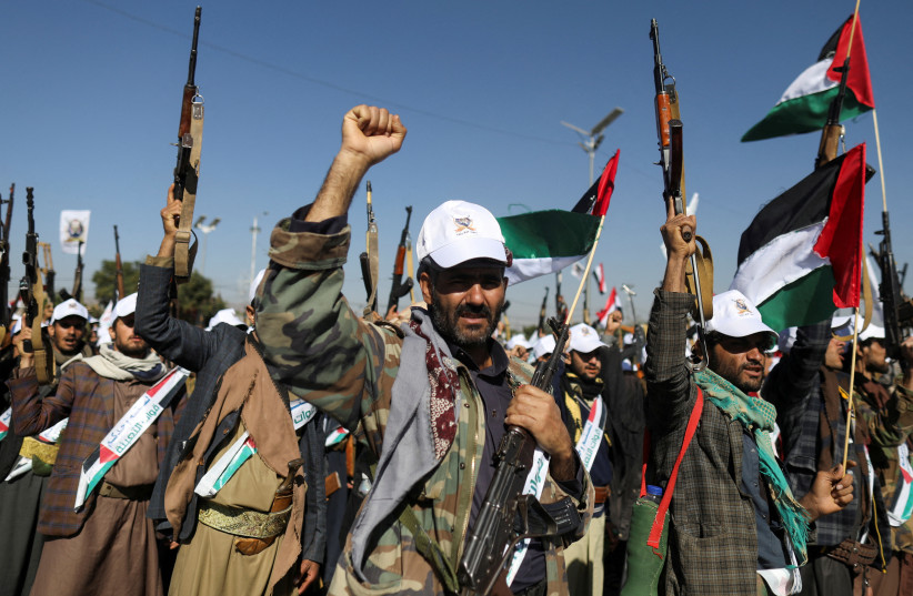  Newly recruited fighters who joined a Houthi military force intended to be sent to fight in support of the Palestinians in the Gaza Strip, march during a parade in Sanaa, Yemen December 2, 2023.  (credit: REUTERS/KHALED ABDULLAH)
