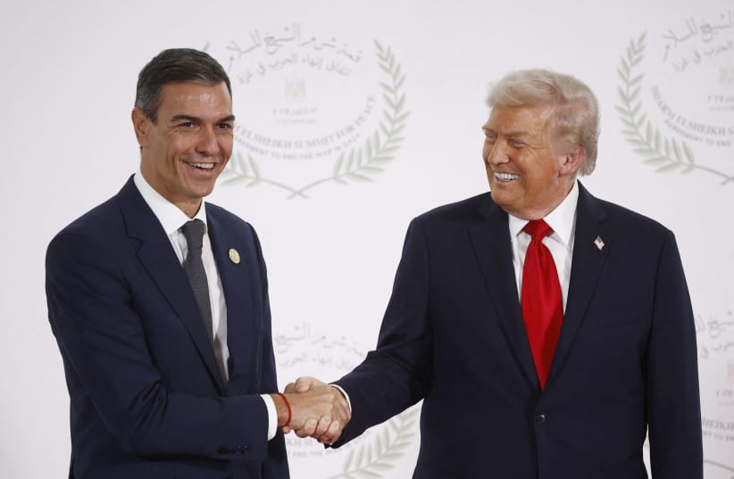 US President Donald Trump and Spain's Prime Minister Pedro Sanchez shake hands as they pose for a photo in Sharm el-Sheikh, Egypt, October 13, 2025