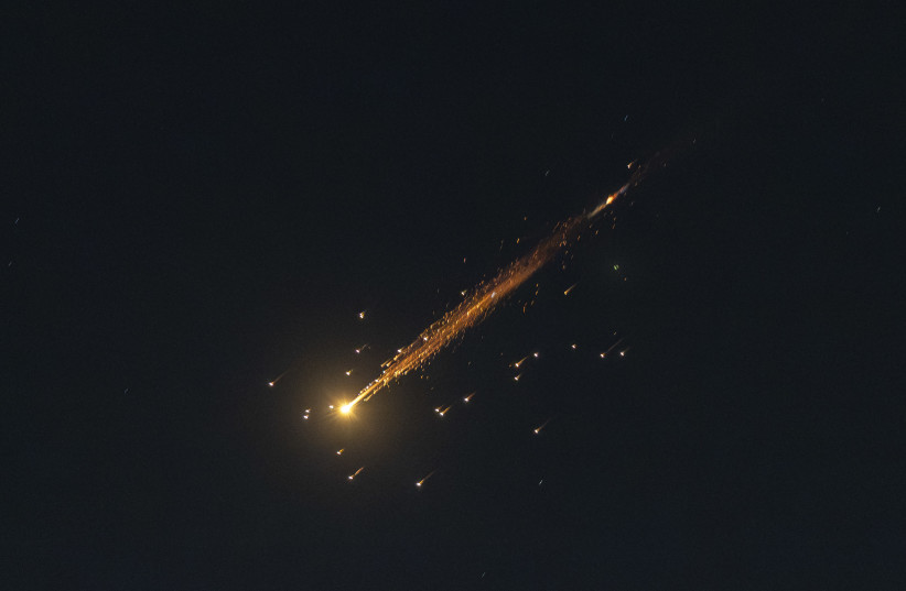 A ballistic missile launched from Iran, as seen over Jerusalem, during the war with Iran and ongoing missile fire toward Israel, March 24, 2026.