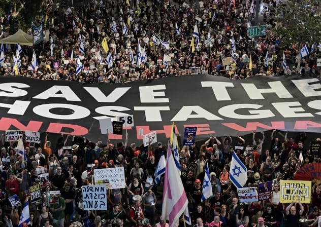  A LARGE banner reads: ‘Save the hostages, end the war,’ at a demonstration on Saturday night in Tel Aviv. The writer asks: ‘Why has the demand for their release not echoed from every capital, every campus, every pulpit?’