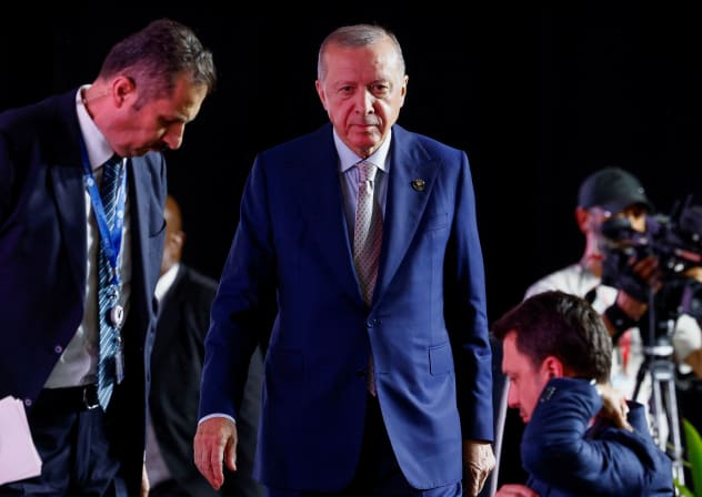 Turkey's President Tayyip Erdogan walks after speaking to the media, at the end of the G20 Leaders' Summit in Johannesburg, South Africa, November 23, 2025