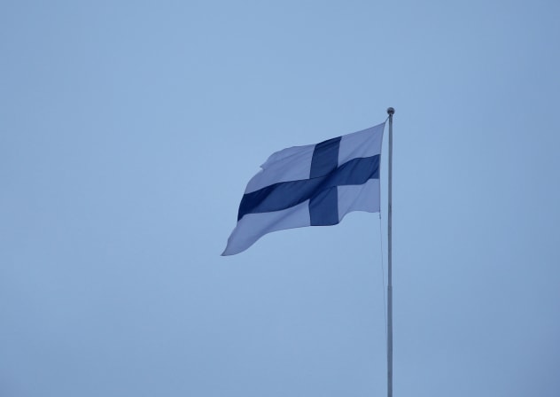 A Finnish flag flies over the City Hall in Helsinki, Finland, February 10, 2024.
