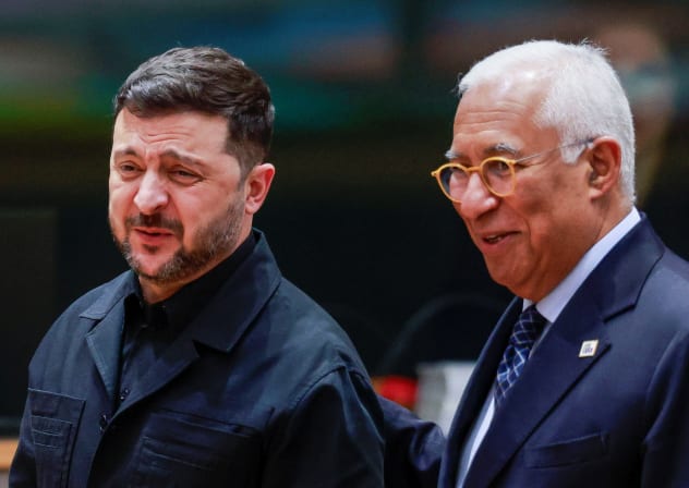 UKRAINIAN PRESIDENT Volodymyr Zelenskiy speaks with European Council President Antonio Costa as they attend a European Union leaders' summit in Brussels, Belgium, December 18, 2025.