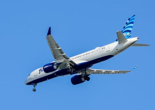 A JetBlue Airlines plane approaches Ronald Reagan Washington National Airport near Alexandria, Virginia, U.S., December 24, 2025.