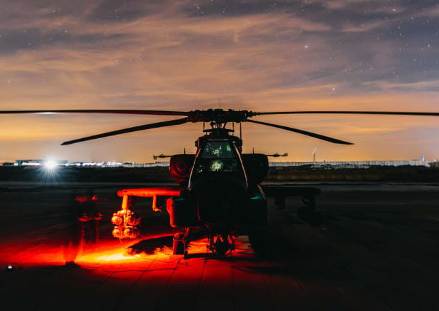 A US Army AH-64 Apache Attack Helicopter prepares to support Operation Hawkeye Strike in the U.S. Central Command area of responsibility, Dec 19, 2025.
