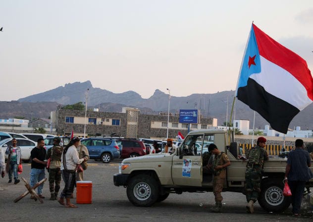 A flag of the UAE-backed separatist Southern Transitional Council (STC) flutters on a military patrol truck, at the site of a rally by STC supporters in Aden, Yemen, January 1, 2026. 