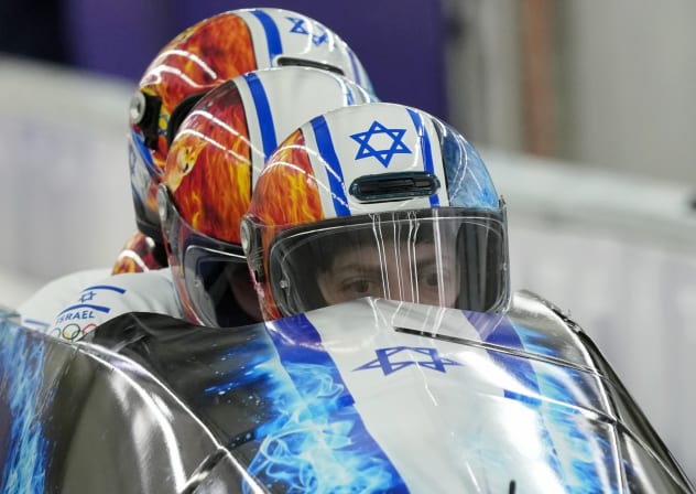Adam Edelman, Menachem Chen, Uri Zisman, and Omer Katz of Israel during four-man bobsleigh during the Milano Cortina 2026 Olympic Winter Games at Cortina Sliding Centre.