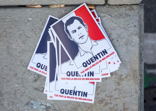 IMAGES REPRESENTING Quentin Deranque, a young far-right activist beaten to death during a violent assault by hard-left activists, with a text message reading: "Killed by Melenchon's militia", on the day of a march in tribute to Quentin Deranque, in Lyon, France, February 21, 2026. 