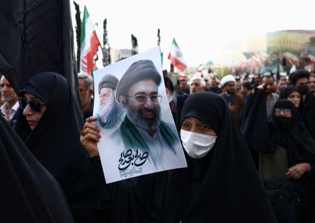People gather for the funeral of Iranian security chief Ali Larijani, in Tehran, Iran, March 18, 2026