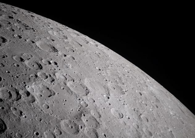 A handout image taken by the Artemis II crew captures craters dotting the surface of the Moon, revealing its rugged, ancient surface, photographed by the NASA Artemis II crew from the Orion spacecraft during the lunar flyby mission, April 6, 2026.