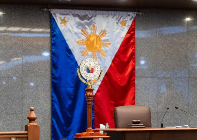 General view of the Filipino flag and the Senate of the Philippines official logo, at the Senate of the Philippines, before the State of the Nation Address SONA 2024.