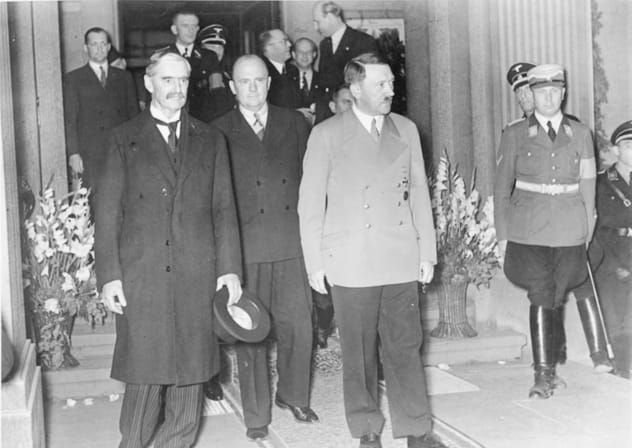 NEVILLE CHAMBERLAIN and Adolf Hitler leave their meeting at Bad Godesberg,  Sept. 23, 1938. 