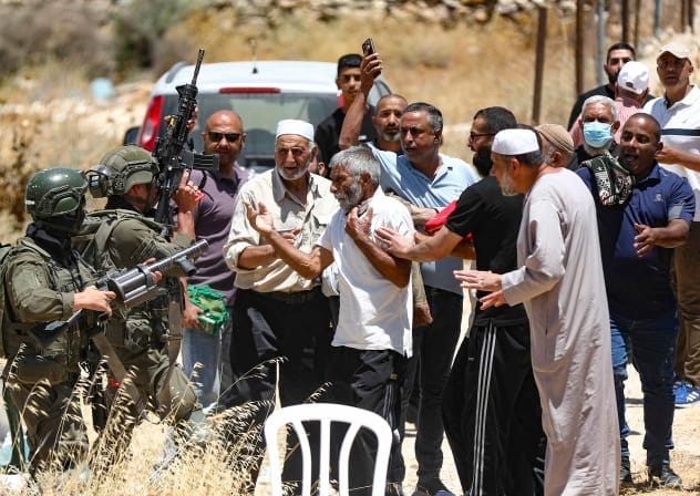 Israeli soldiers clash with Palestinians as they hold Friday prayers during a protest against Israeli settlement expansion and land confiscation near Bethlehem in the West Bank, July 3, 2026.