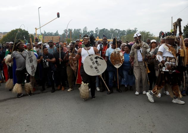Supporters of the South African anti-immigrant group 'March and March' hold a demonstration, after an unofficial June 30 deadline set by anti-immigrant groups for undocumented migrants to leave the country had passed, in Umzimkhulu, South Africa, July 13, 2026. 