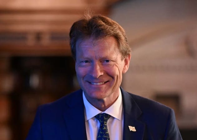 Reform UK Deputy Leader Richard Tice is seen as Reform UK leader Nigel Farage (not seen) speaks during a press conference, August 3, 2026.