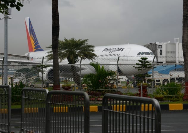 A Philippine Airlines plane stands parked on the tarmac at Manila's International airport on November 8, 2013; Illustrative.