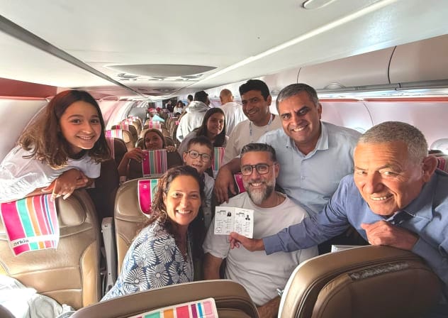 The Jewish Agency Chairman Maj. Gen. (res.) Doron Almog (far right) and Aliyah and Integration Minister Ofir Sofer with a new Olim family from France, August 3, 2026.
