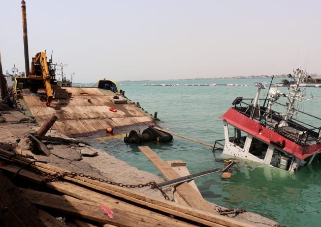 The navigation bridge of a sunken vessel is all that is seen at the surface of the water in the Port of Mokha the day after an attack by the Houthis on the city Mokha, held by Yemen's internationally recognised, Aden-based government on August 10, 2026; Illustrative.