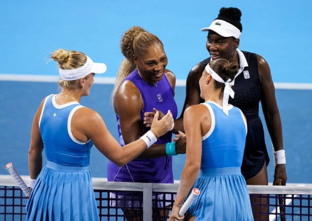 Serena Williams and Venus Williams of the United States meet with Peyton Stearns of the United States and Marta Kostyuk of Ukraine, after their doubles match during the Cincinnati Open at Lindner Family Tennis Center, August 17, 2026.