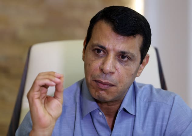 Palestinian senior Fatah official Mohammed Dahlan gestures during an interview at his office in Abu Dhabi on September 16, 2015.