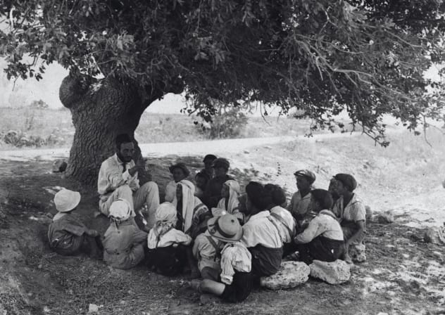 Children studying outdoors in Kfar Hasidim in August, 1925.