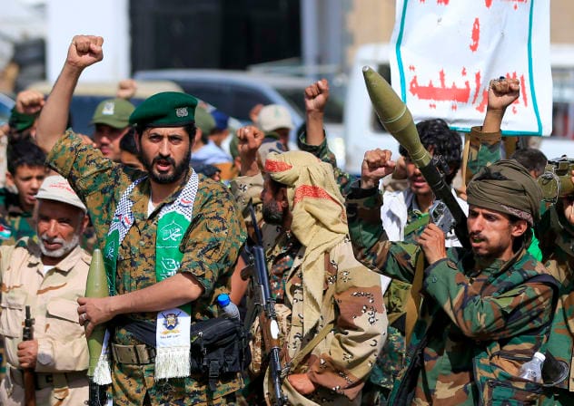 Fighters loyal to the Houthi authorities, shouts slogans during a rally to recruit more fighters, in Sanaa on September 10, 2026.