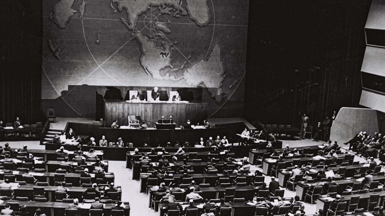 The UN vote, taking place in the main gallery of the Queens Museum