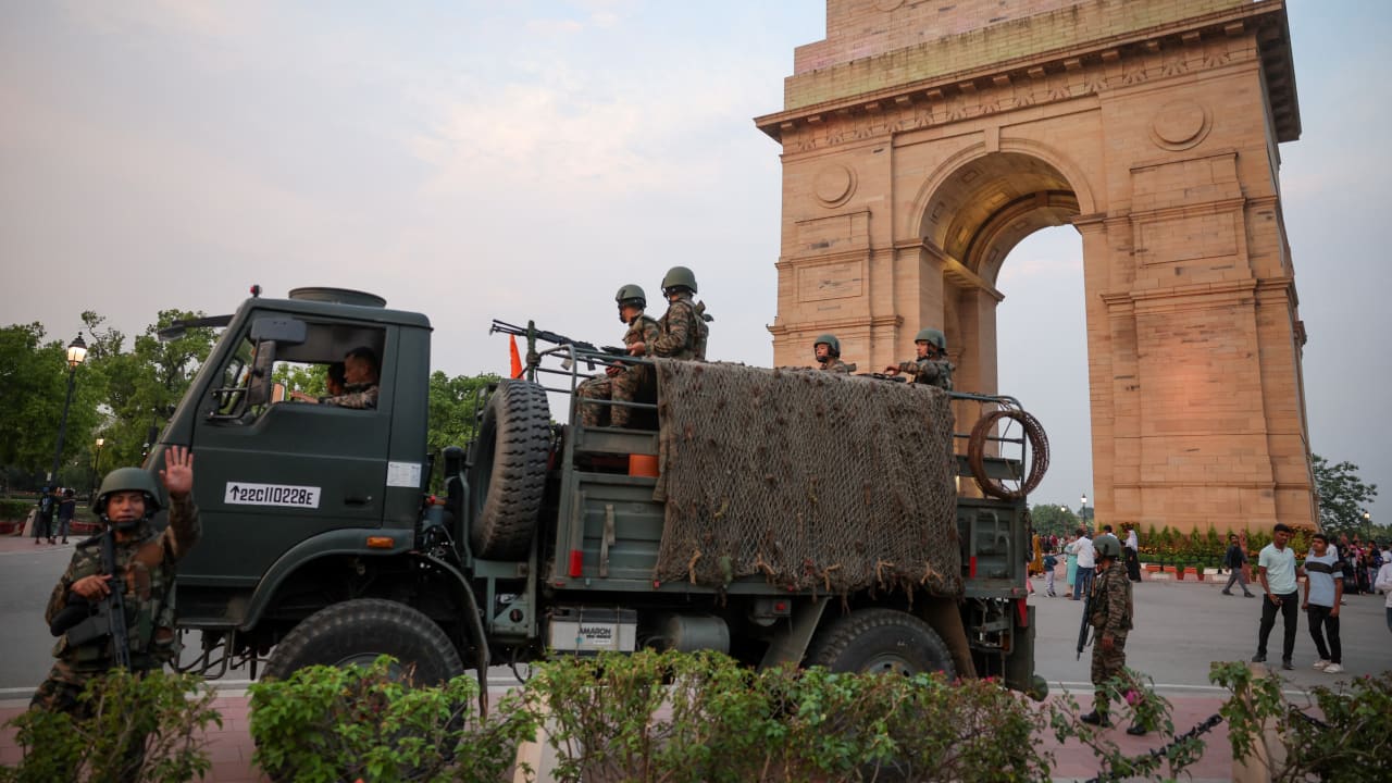  Military personnel with Indian Army stand guard at India Gate in New Delhi, India, May 8, 2025