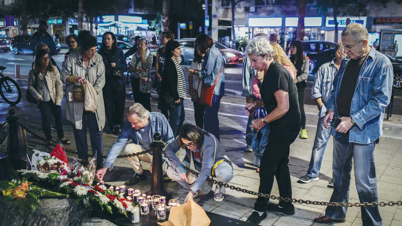 PEOPLE VISIT the memorial site for prime minister Yitzhak Rabin at the scene of his assassination in 1995, at Rabin Square in Tel Aviv, on November 4, 2024.