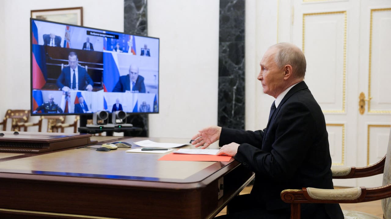 Russian President Vladimir Putin chairs a meeting with members of the Security Council via a video link in Moscow, Russia November 14, 2025