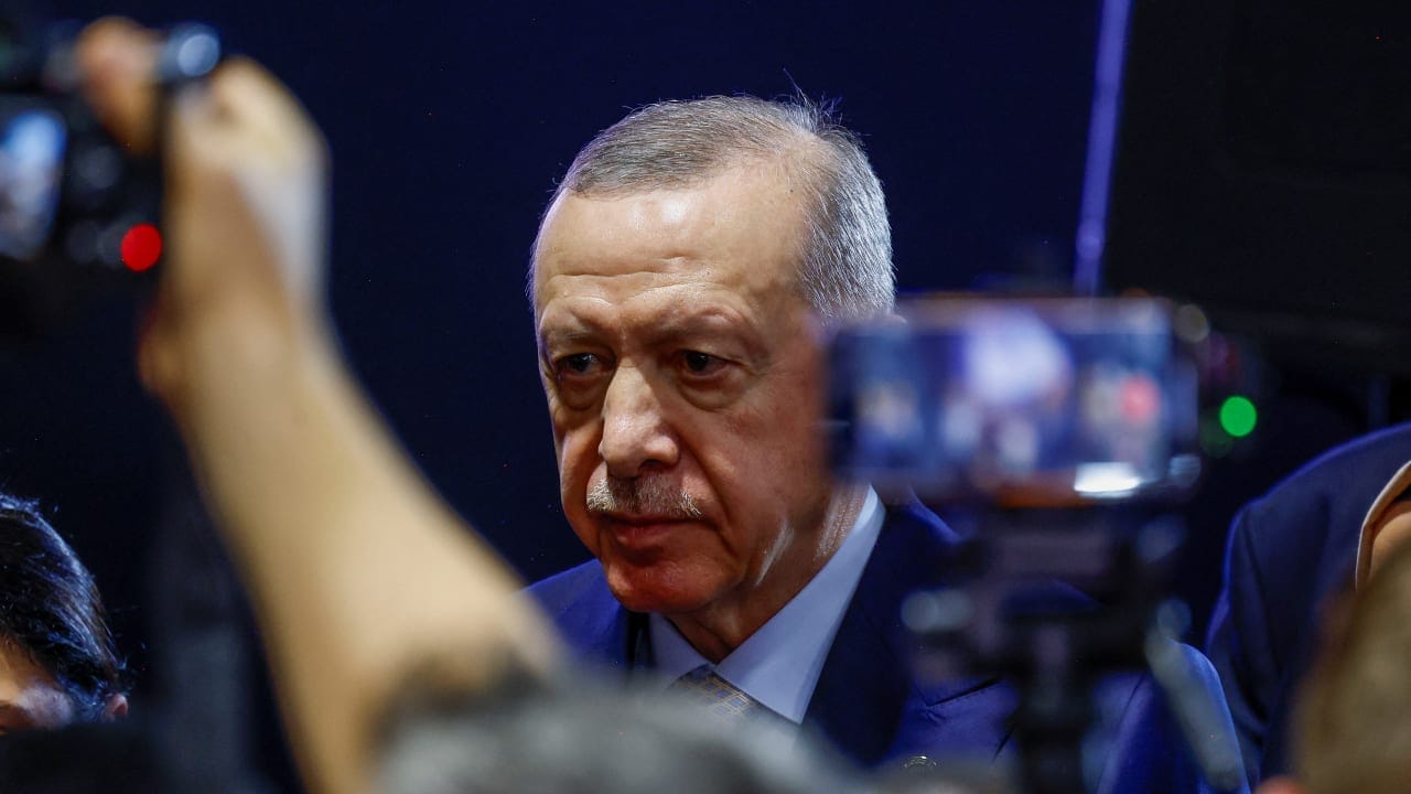 Turkey's President Tayyip Erdogan walks after speaking to the media, at the end of the G20 Leaders' Summit in Johannesburg, South Africa, November 23, 2025
