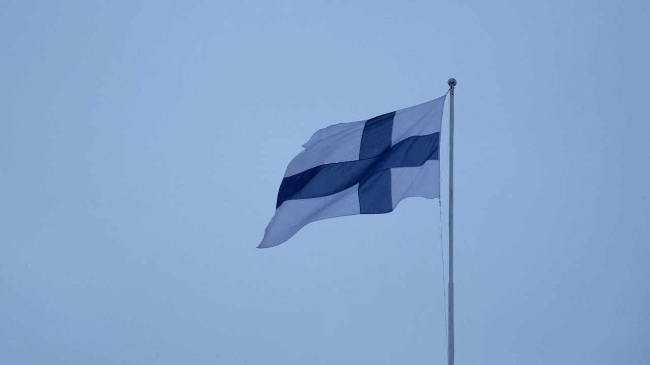A Finnish flag flies over the City Hall in Helsinki, Finland, February 10, 2024.