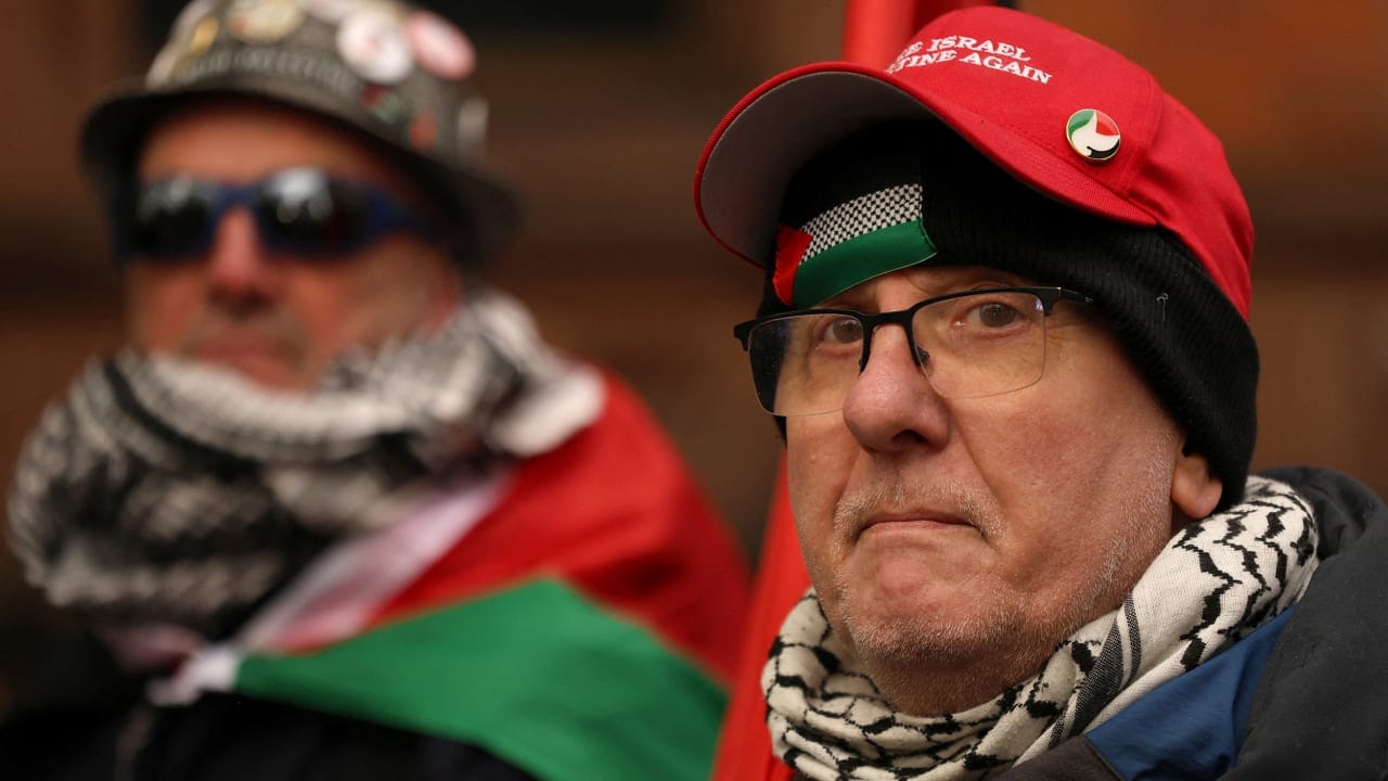 SUPPORTERS OF Defend Our Juries take part in a protest as part of the group's campaign to lift the ban on Palestine Action, ahead of a judicial review in London next week, in Belfast, Northern Ireland, November 22, 2025.