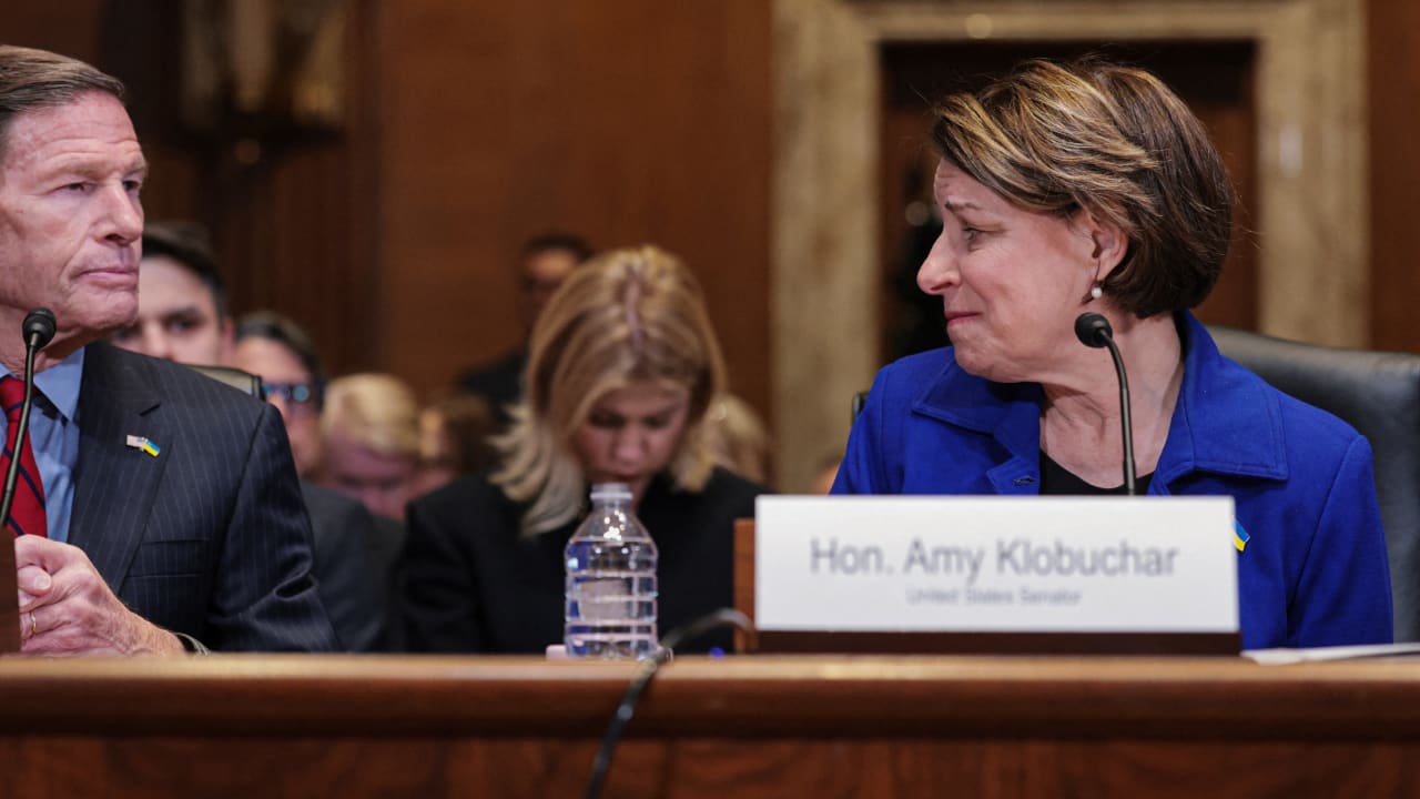 US Senator Amy Klobuchar (D-MN) (R), with Senator Richard Blumenthal (D-CT) (L) at a Senate Appropriations subcommittee hearing in Washington, December 3, 2025; illustrative.