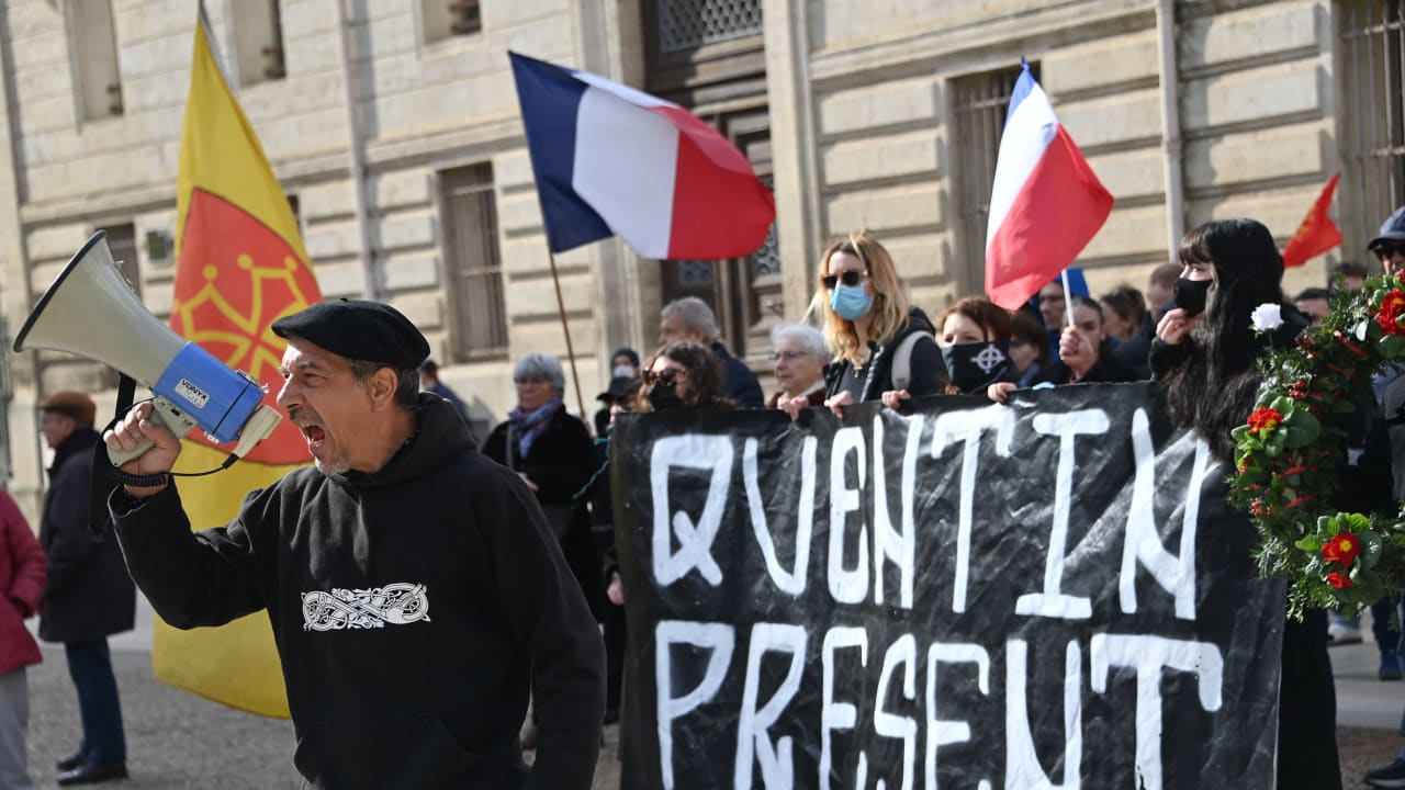 Activist of the far-right identitarian movement 'Ligue du Midi' Olivier Roudier shouts in a megaphone in Montpellier, southern France, on February 15, 2026, during a rally after the fatal beating of a 23-year-old Quentin. 