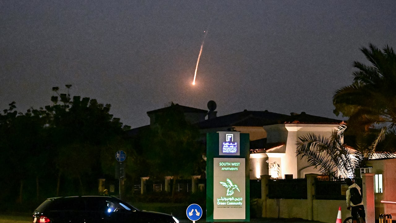 A projectile falls over Dubai on February 28, 2026. AFP correspondents heard a loud explosion in Dubai on February 28 and one of them saw a plume of smoke rising from the city. The explosions came in the wake of wide-ranging Iranian attacks on the Gulf, in retaliation for US and Israel strikes on Ir