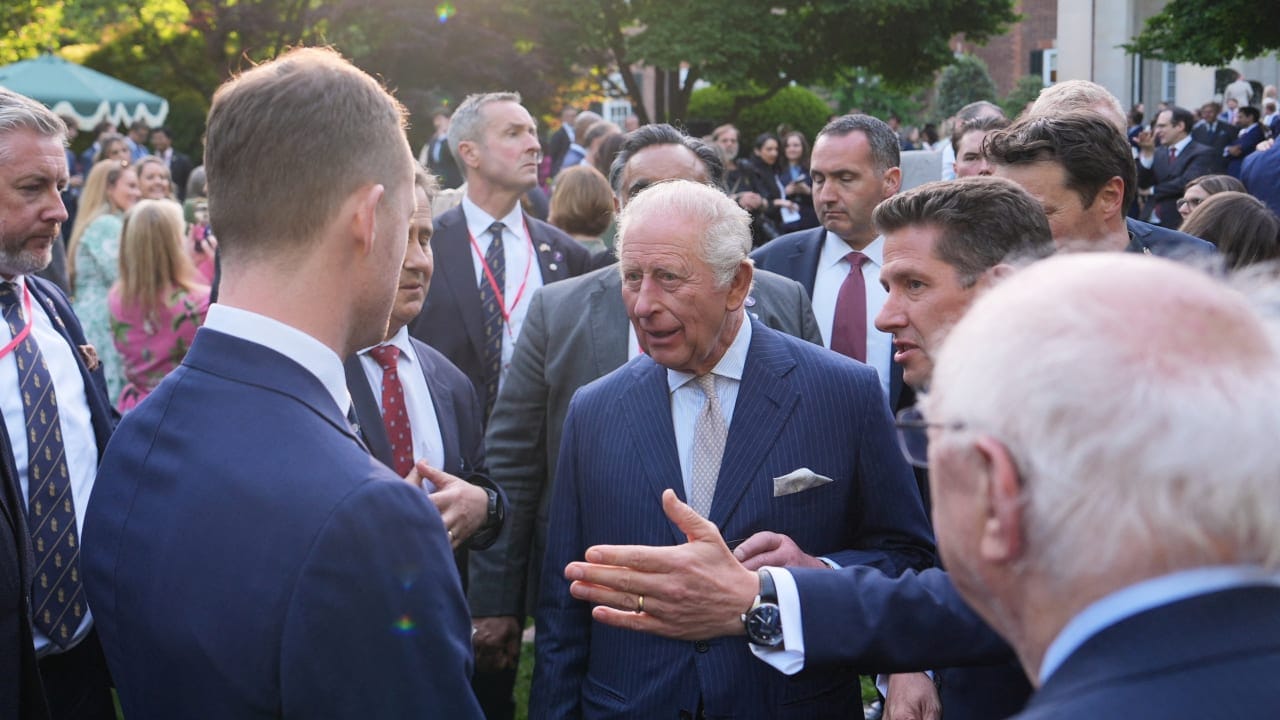 Britain’s King Charles III speaks with guests during a garden party at the British Embassy, Monday, April 27, 2026, in Washington, D.C. U.S. 