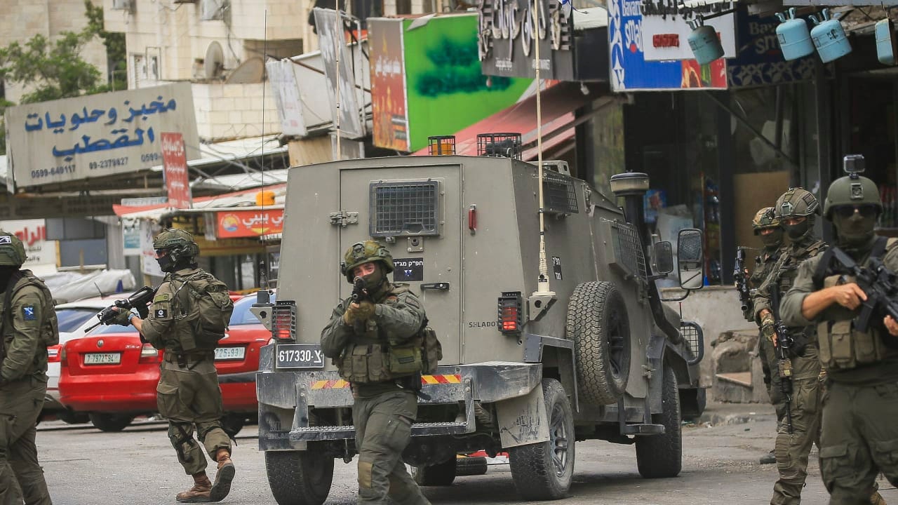 Israeli security forces operate during a raid in the West Bank city of Nablus, May 3, 2026.